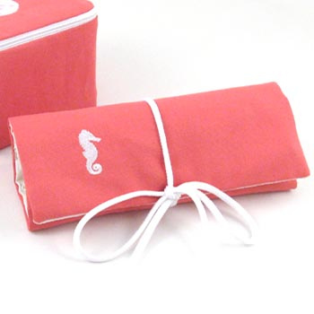 coastal jewelry roll with embroidered icon